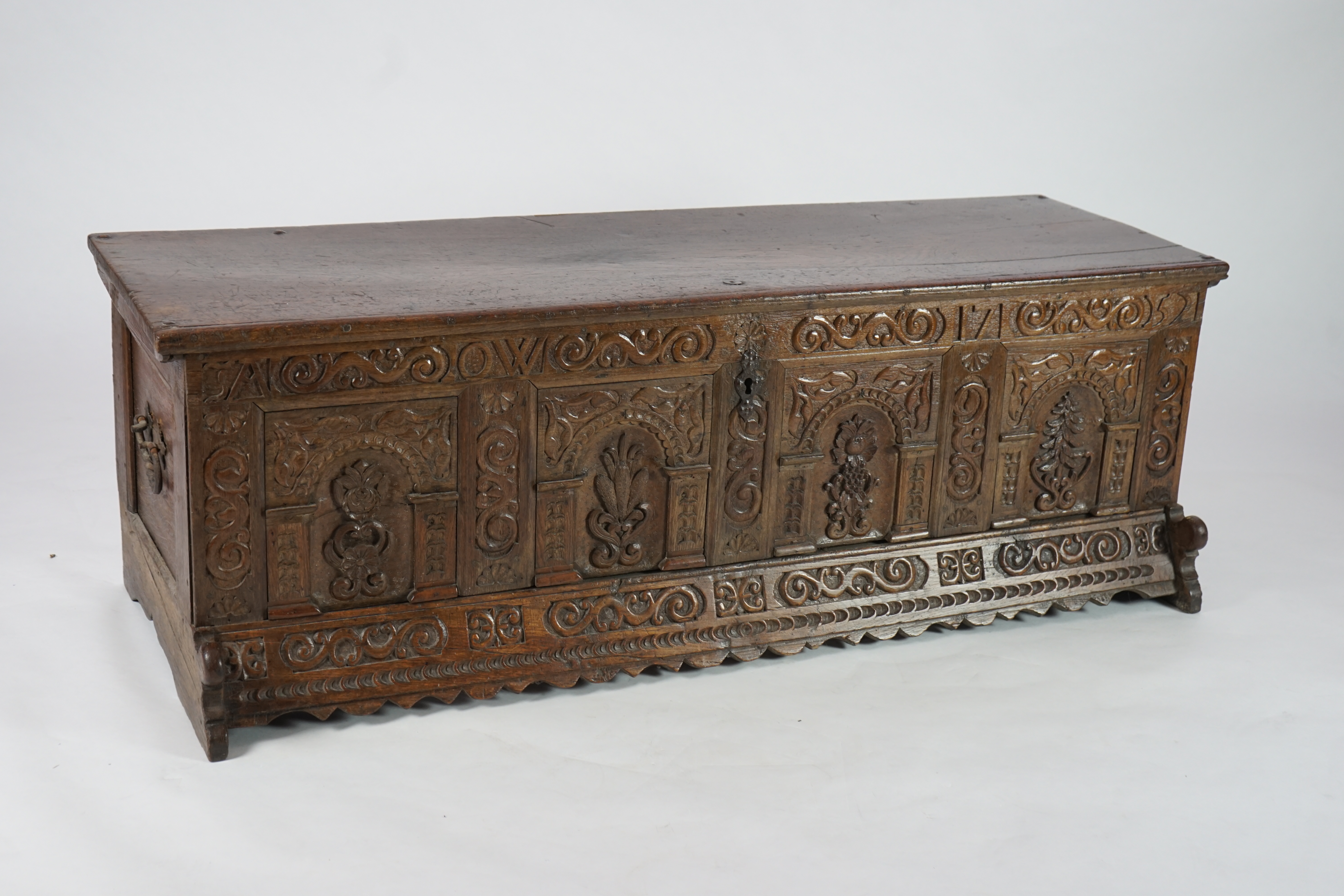 A mid 18th century German carved oak marriage chest